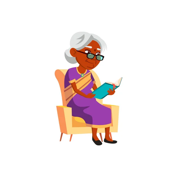 Mujer India Edad Madura Lectura Libro Recetas Sala Estar Silla — Vector de stock