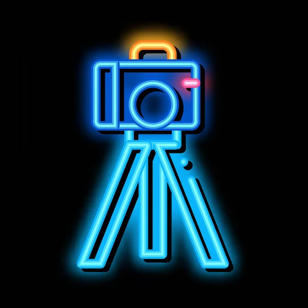 Video camera with tripod neon glow icon illustration — Stock Vector