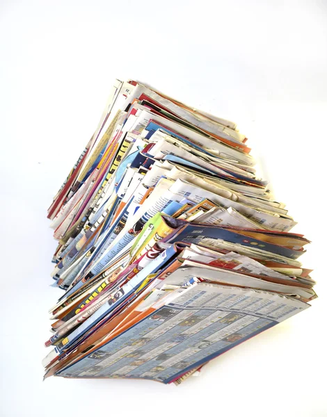 Um conjunto de diferentes revistas sobre um fundo branco — Fotografia de Stock