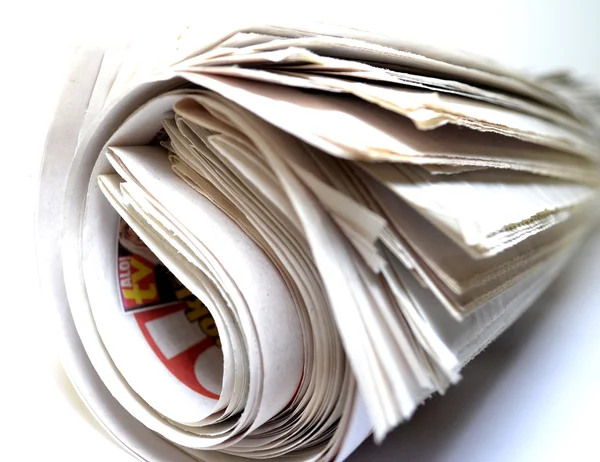 Rolled up newspaper — Stock Photo, Image