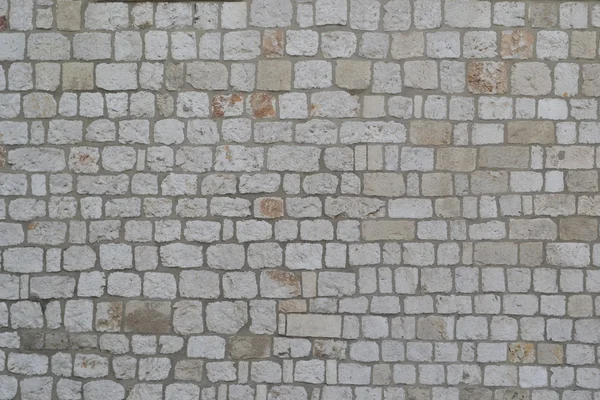 Gamla antika stenmuren bakgrund — Stockfoto