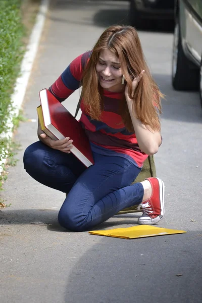 Hold on! All my books fell to the ground — Stock Photo, Image