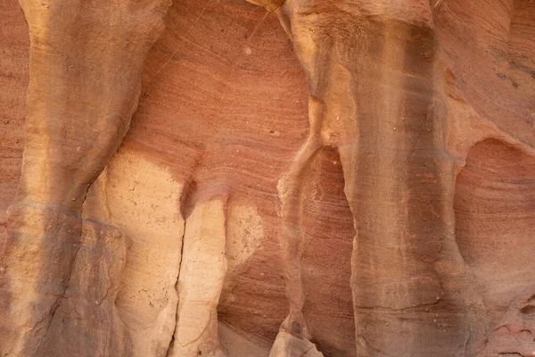 A unique colorful eroded sedimentary rock formation in the Timna valley park, the Negev desert, southern Israel.