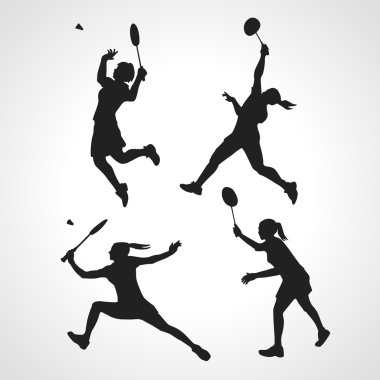 Silhouettes of women professional badminton players. Vector set clipart