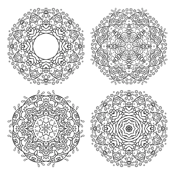 Set of vector flower ornaments — Stock Vector