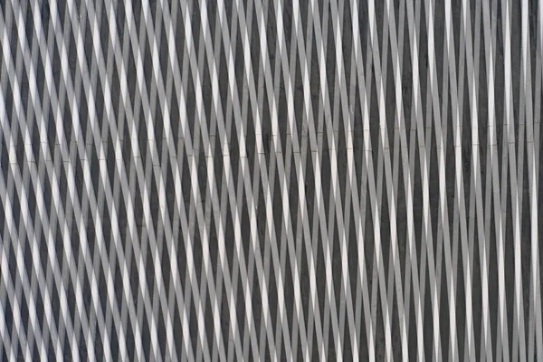 Abstract background of intersecting metal lines in industrial style