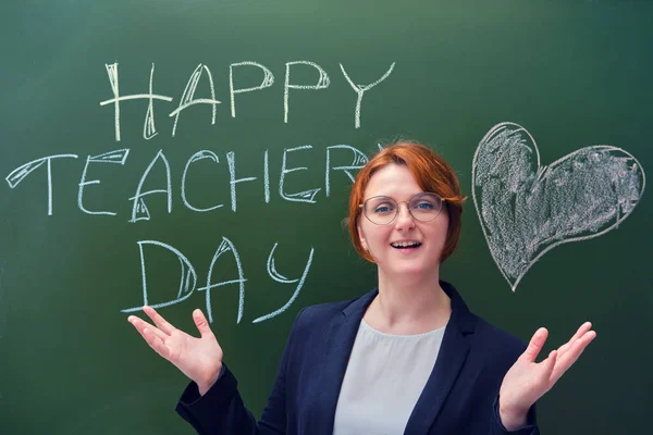 A woman is happy to congratulate a happy teacher\'s day.
