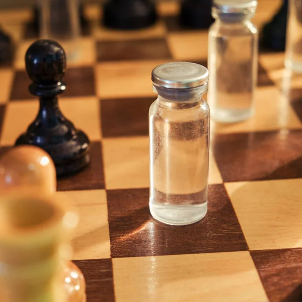 A vaccine against the virus in a chess game, the concept of a pandemic and politics