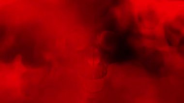 A haunting Halloween animation featuring a menacing carved pumpkin skull with a flickering candle flame burning inside against a dark background. Perfect for adding a chilling atmosphere to horror projects, Halloween promotions, and seasonal graphics