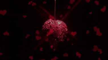 Kırmızı parıltılı bir kalp. Sevgililer Günü konsepti.