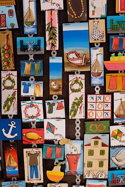 Colourful fridge magnet souvenirs on sale to tourists, Corfu, Greece. High quality photo