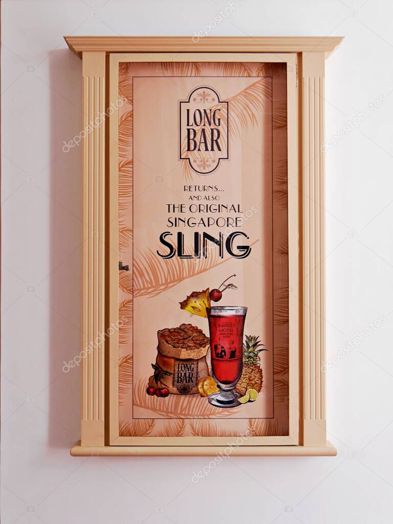 Poster showing picture of the iconic Singapore Sling cocktail invented in the legendary Long Bar at Raffles Hotel, Singapore, now reopened