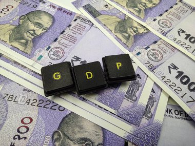 Hint para birimi ve GDP kelimesi heceleniyor