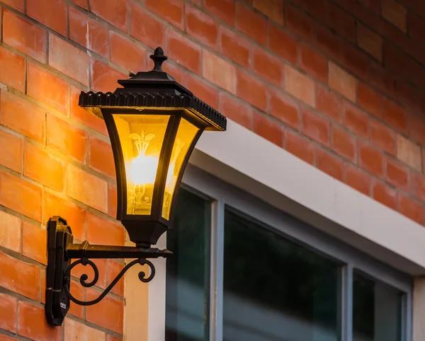 Wall lamp with yellow shade — Stock Photo, Image