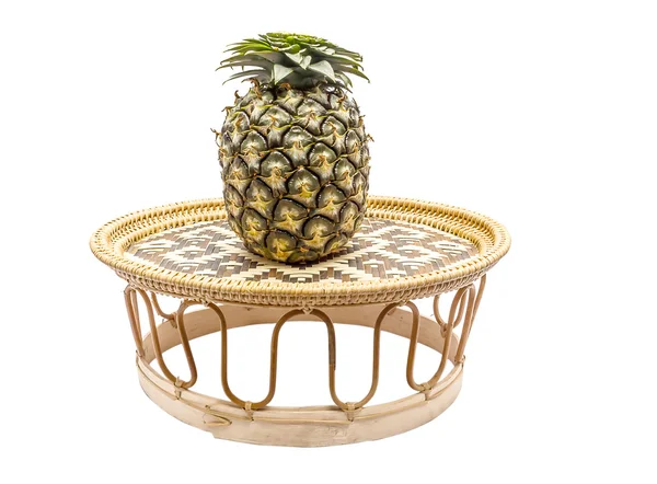 Pineapple on bamboo tray isolated on white back ground — Stock fotografie
