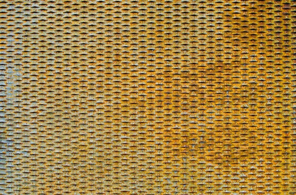 Rusty metal mesh texture. Copy space. Yellow color. — Stock Photo, Image