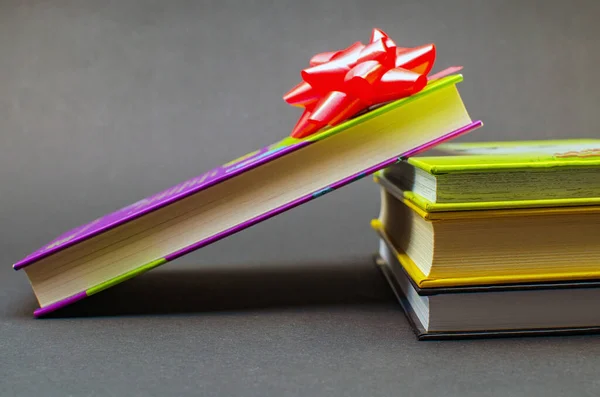 Books Wrapped Colored Tape Table Dark Background Copy Space — Stock Photo, Image