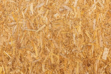 OSB dokusu. Çizgili çarşaf. Arka plan olarak kullanılabilir. İnşaat konsepti, yenileme, inşaat malzemeleri.