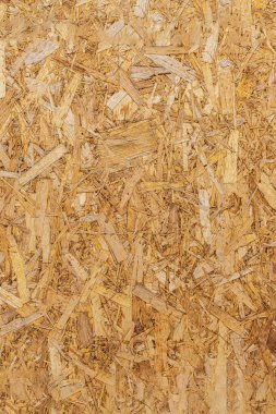 OSB dokusu. Çizgili çarşaf. Arka plan olarak kullanılabilir. İnşaat konsepti, yenileme, inşaat malzemeleri.