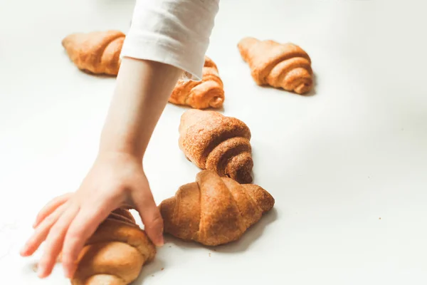 Fresh Croissants White Background Little Girls Hand Reaching Out Homemade — Stock Photo, Image