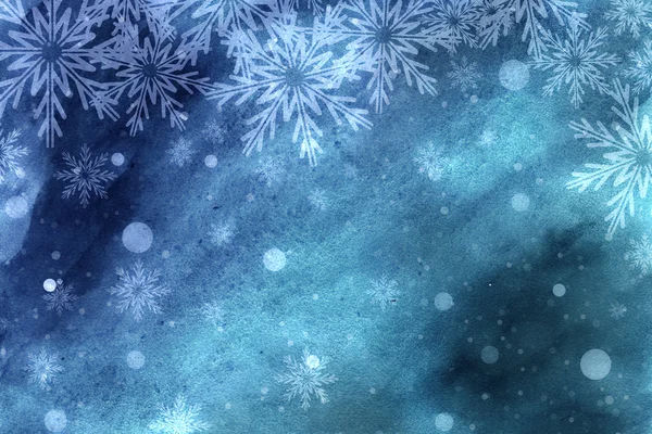 Schneeflocken auf blauem Hintergrund — Stockfoto