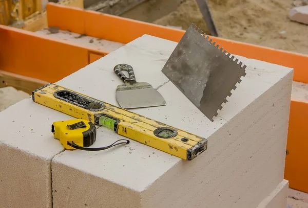 a tool for laying foam blocks. close-up