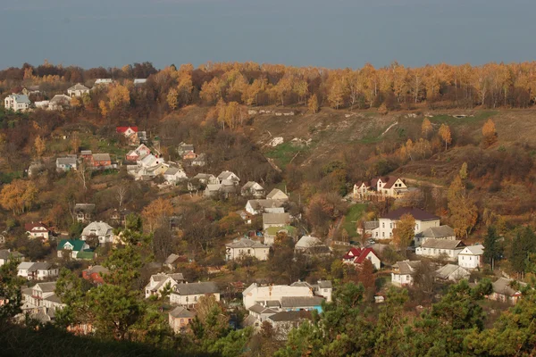 Golden Autumn in the mountains above the town — Stock Photo, Image