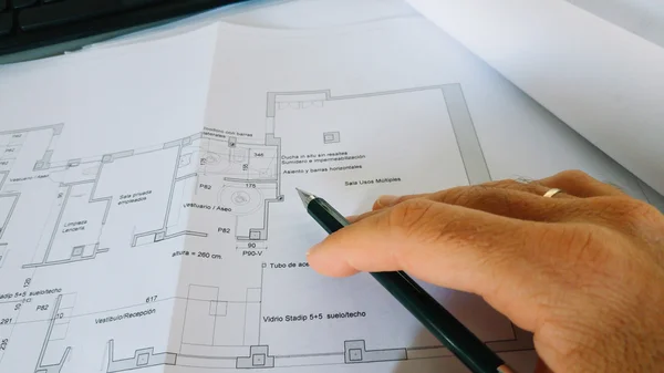 Architect with drawings — Stock Photo, Image