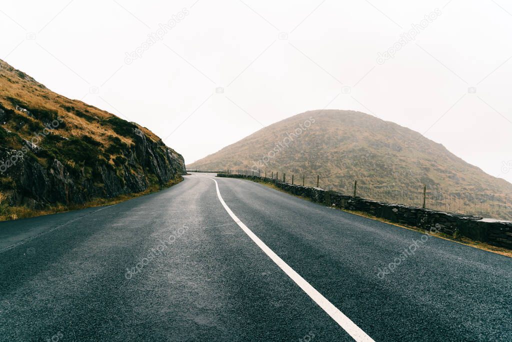 Misty Lonely Road in the Wild Atlantic Way of Ireland