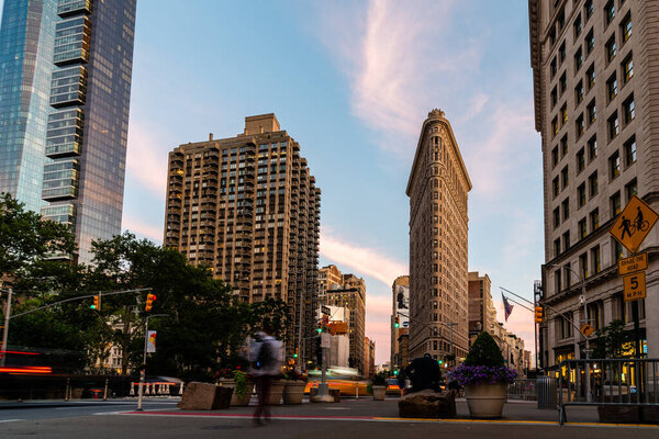 New York City, USA - June 26, 2018: Scenic View of Madison Square and Flatiron Building at Sunset. Long Exposure with motion blur