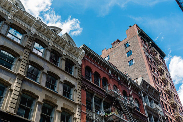 Typical buildings in Soho Cast Iron historic District in New York City. Buildings with firescapes in NYC