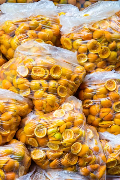 Bags with hundreds of orange peel — Stock Photo, Image