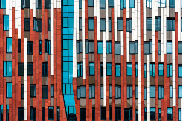 Hamburg, Germany - August 7, 2019: New Sumatrakontor building at Hamburg HafenCity, a mixed-use block by Dutch architect Erick van Egeraat. Shops, offices, luxury apartments and five star hotel