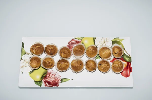 Home made muffins isolated on a table — Stock Photo, Image