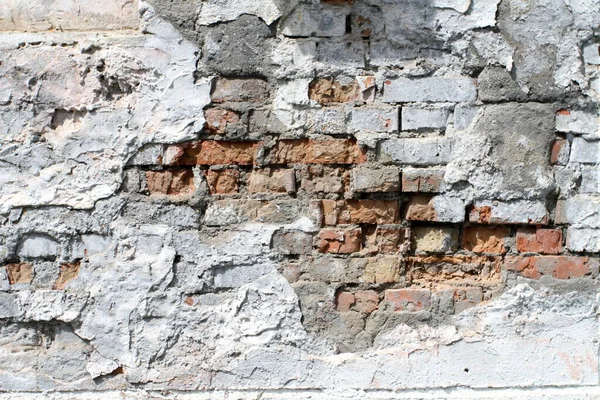 古いレンガの壁のクローズアップ自然光 家のファサードの詳細 — ストック写真