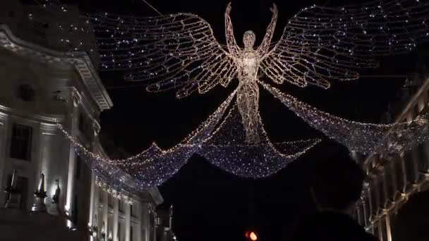 Χριστουγεννιάτικα Φώτα Αγγέλων Εμφανίζονται Στην Οδό Ρίτζεντ Στο Λονδίνο Κλειδωμένο — Αρχείο Βίντεο