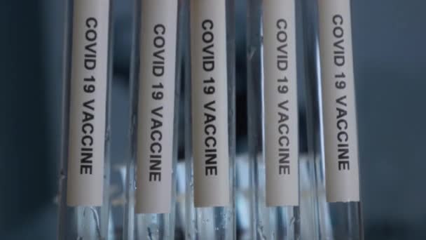 Janssen Covid Vaccine Test Tubes Rack Pan Close — Stock Video