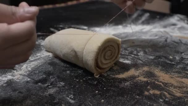 Woman Hands Cutting Cinnamon Roll Dough String Locked Close — Stock Video