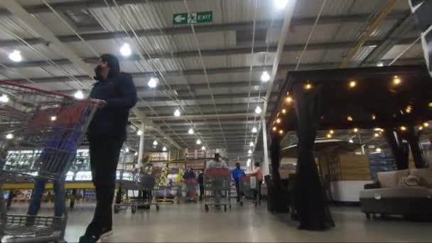 Pov Trolly Costco Warehouse Follow Shot — Stock Video