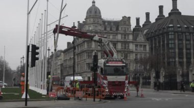 Crane Lorry Helping To Install Flagpole In Parliament Square Gardens. Locked Off 