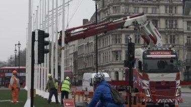 Workers Installing Flagpole In Parliament Square Gardens. Locked Off