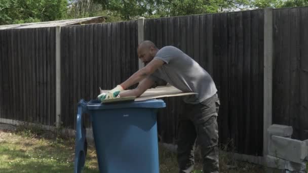 Ethnic Minority Adult Male Using Knife Cut Cardboard Blue Recycling — Stock Video