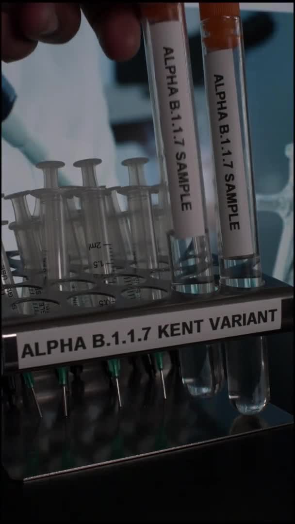 Alpha Kent Variant Test Tube Vials Being Taken Rack Vertical — Αρχείο Βίντεο