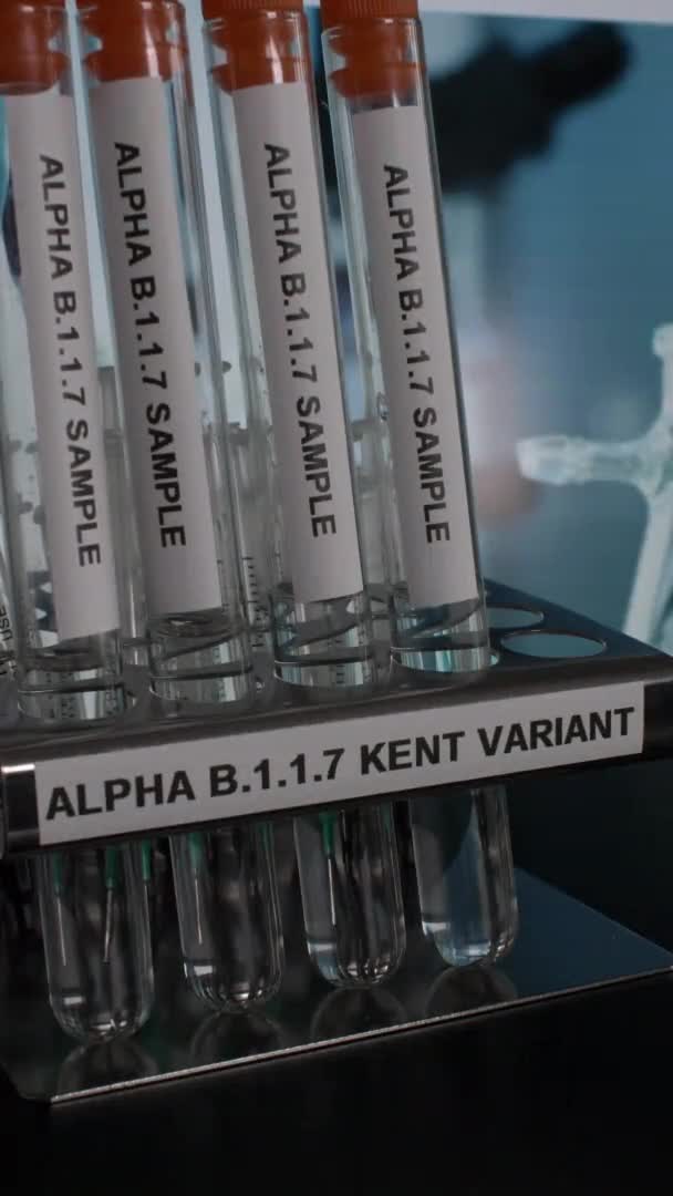 Alpha Kent Variant Test Tube Vials Being Taken Rack Vertical — Stockvideo