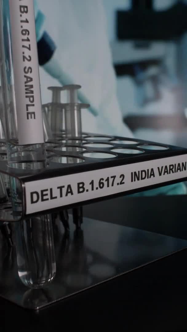Delta 617 Indische Variant Testbuis Monsters Worden Geplaatst Rack Verticale — Stockvideo