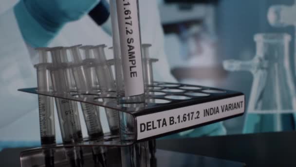 Delta 617 Indian Variant Test Tube Vials Being Placed Rack — Stok video
