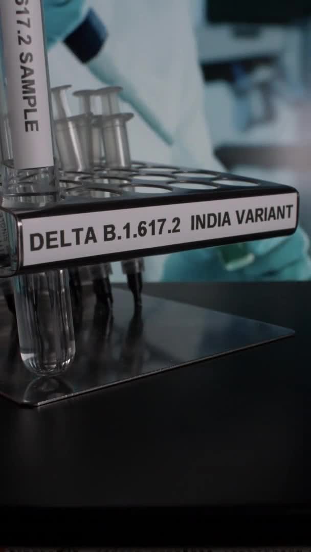 Delta 617 Indian Variant Test Tube Vials Being Placed Rack — Vídeo de Stock