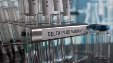 Delta Plus Variant Test Tube Sample Vials Being Taken Off Rack. Locked Off