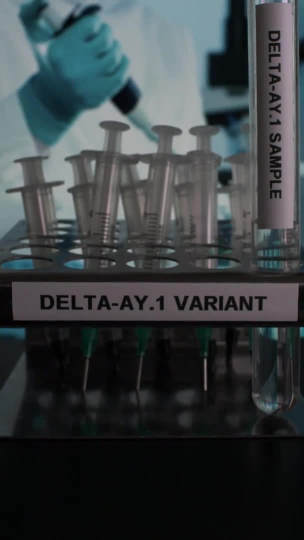 Delta Variant Test Tube Samples Being Placed Rack Vertical Video — Stockvideo