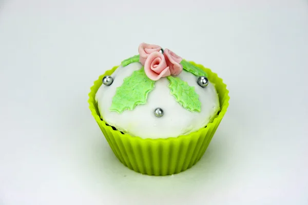 Close up of decorated muffins on a white background — Stock Photo, Image